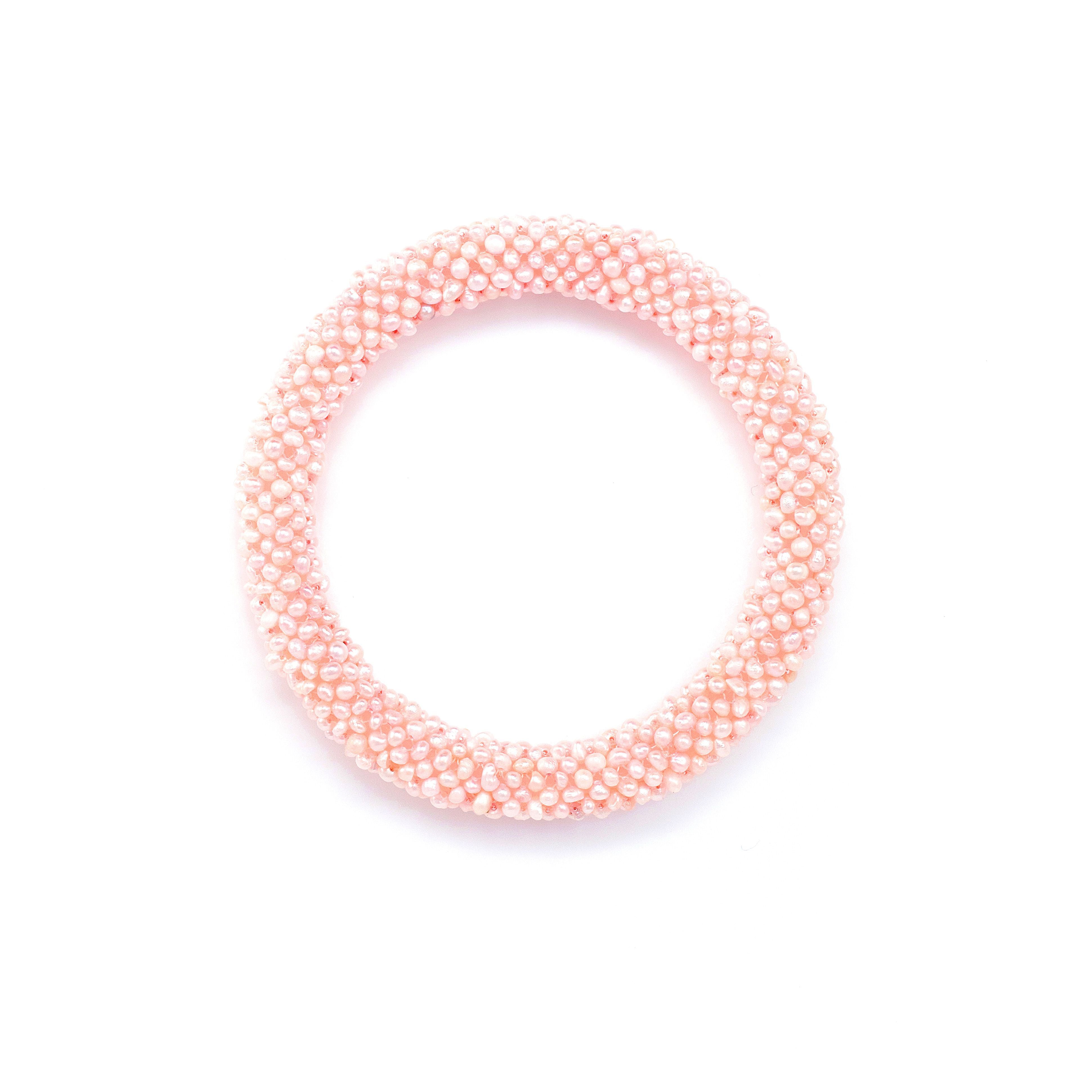 Brazalete de Perlas cultivadas tejidas Arroz color rosa.